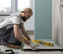 FreshFit worker installs new tiles